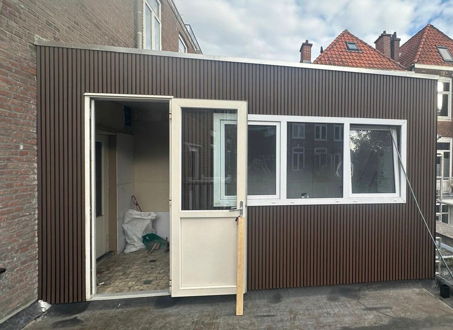 Weer een tevreden klant: dakopbouw volledig bekleed met WPC gevelbekleding in Ipe + Black